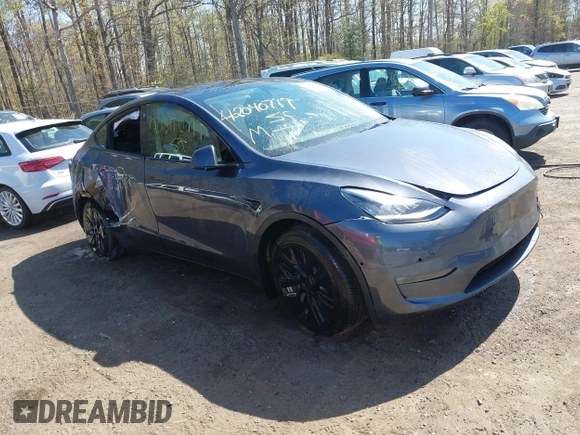 2022 Tesla Model Y Long Range z VIN 7SAYGAEE9NF574634, wystawiony jako IAAI lot #42040719 z przebiegiem 29 675 mil mil oraz . Historia ofert i sprzedaży dostępna na DreamBid. Obrazek 1.