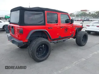 2018 Jeep Wrangler Unlimited Rubicon с VIN 1C4HJXFG4JW156506, выставлен на аукционе IAAI как лот 42246880 с пробегом 57 062 миль миль и . История ставок и продаж доступна на DreamBid. Изображение 4.