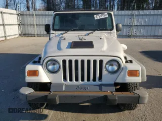 2004 Jeep Wrangler Sport Right Hand Drive with VIN 1J4F449S24P802440, listed as a Copart auction lot 47664495 with 138,950 mi miles and Clean Title. Bid and sale history available at carsss.com. Image 5.