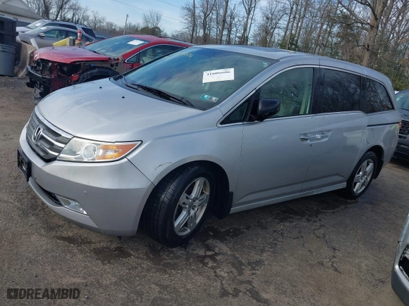 2013 Honda Odyssey Touring with VIN 5FNRL5H97DB021403, listed as a IAAI auction lot 41606606 with 223,547 mi miles. Bid and sale history available at carsss.com. Image 17.