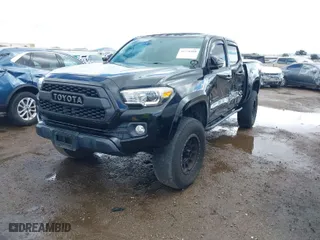 2017 Toyota Tacoma SR5 with VIN 3TMCZ5AN6HM095893, listed as a IAAI auction lot 41778488 with 81,276 mi miles. Bid and sale history available at carsss.com. Image 2.