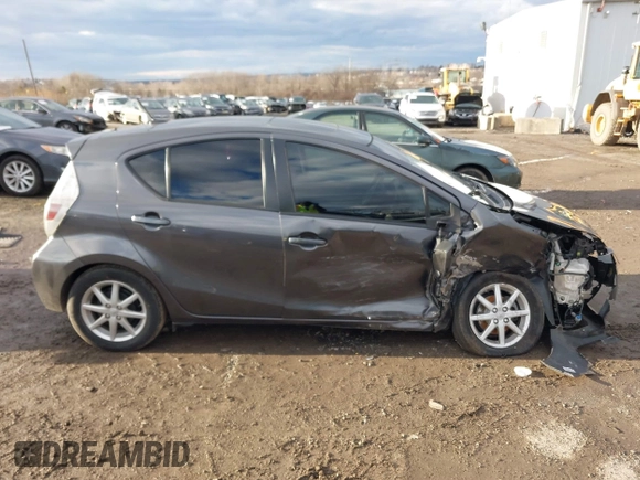 2012 Toyota Prius c One with VIN JTDKDTB31C1029950, listed as a IAAI auction lot 41223112 with 117,660 mi miles. Bid and sale history available at carsss.com. Image 14.