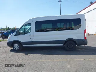 2015 Ford Transit Passenger XL z VIN 1FBAX2CG7FKA75719, wystawiony jako IAAI lot #42135118 z przebiegiem Nie podano mil oraz . Historia ofert i sprzedaży dostępna na DreamBid. Obrazek 14.