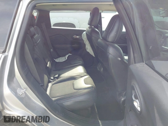 2015 Jeep Cherokee Trailhawk with VIN 1C4PJMBS0FW522182, listed as a IAAI auction lot 42544508 with 74,910 mi miles and . Bid and sale history available at DreamBid. Image 8.