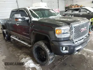 2015 GMC Sierra 2500HD available WiFi Denali with VIN 1GT120E84FF535352, listed as a IAAI auction lot 41237529 with 155,369 mi miles. Bid and sale history available at carsss.com. Image 1.