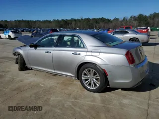 2016 Chrysler 300 with VIN 2C3CCAEG5GH105935, listed as a Copart auction lot 45268505 with 141,721 mi miles and Salvage Title. Bid and sale history available at carsss.com. Image 2.