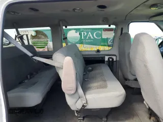 2005 Ford Econoline Passenger XL with VIN 1FBNE31L55HA93452, listed as a Copart auction lot 51860995 with 237,049 mi miles and Clean Title. Bid and sale history available at carsss.com. Image 11.