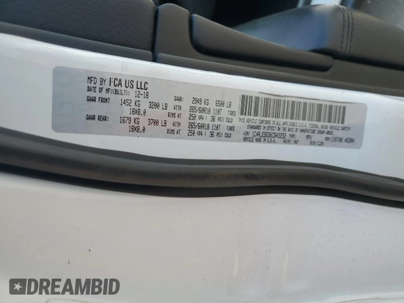 2019 Jeep Grand Cherokee Limited with VIN 1C4RJEBG5KC643232, listed as a Copart auction lot 58371565 with 106,423 mi miles and Salvage title. Bid and sale history available at DreamBid. Image 13.