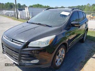 2013 Ford Escape SEL with VIN 1FMCU0HX8DUB38480, listed as a IAAI auction lot 42176271 with 154,309 mi miles. Bid and sale history available at carsss.com. Image 2.