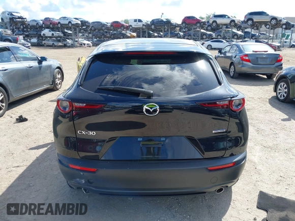 2021 Mazda CX-30 Select z VIN 3MVDMABL1MM251761, wystawiony jako IAAI lot #42267217 z przebiegiem 42 617 mil mil oraz . Historia ofert i sprzedaży dostępna na DreamBid. Obrazek 15.