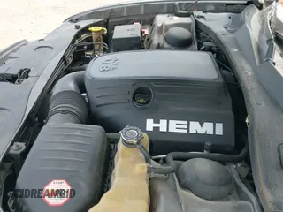 2013 Dodge Charger RT z VIN 2C3CDXCT5DH716883, wystawiony jako IAAI lot #41884762 z przebiegiem 240 867 mil mil oraz . Historia ofert i sprzedaży dostępna na DreamBid. Obrazek 19.