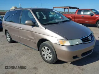 2003 Honda Odyssey EX-L with VIN 5FNRL18943B069383, listed as a IAAI auction lot 41955907 with 171,394 mi miles and . Bid and sale history available at DreamBid. Image 1.