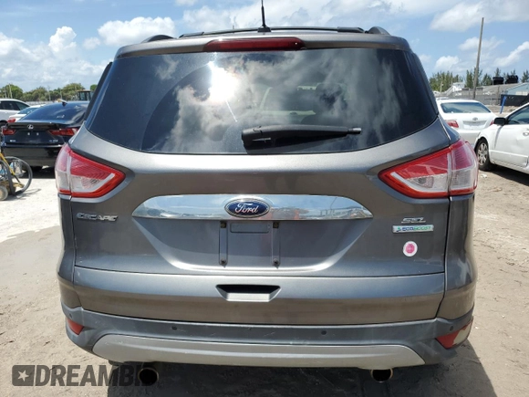 2013 Ford Escape SEL with VIN 1FMCU0HX2DUB77937, listed as a Copart auction lot 55948845 with 137,000 mi miles and Clean Title. Bid and sale history available at DreamBid. Image 6.