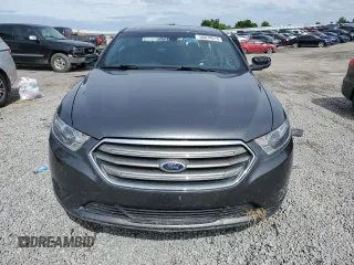2015 Ford Taurus SEL z VIN 1FAHP2E89FG177287, wystawiony jako Copart lot #56074615 z przebiegiem 196 421 mil mil oraz Szkoda całkowita • Salvage title. Historia ofert i sprzedaży dostępna na DreamBid. Obrazek 5.