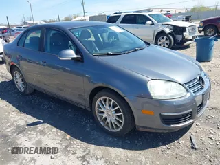 2008 Volkswagen Jetta z VIN 3VWRJ81K08M164826, wystawiony jako IAAI lot #42143512 z przebiegiem 225 739 mil mil oraz . Historia ofert i sprzedaży dostępna na DreamBid. Obrazek 1.