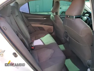 2018 Toyota Camry LE с VIN 4T1B11HK5JU073663, выставлен на аукционе Copart как лот 55656575 с пробегом 100 578 миль миль и Списание • Salvage title. История ставок и продаж доступна на DreamBid. Изображение 10.