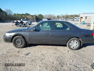 2001 Toyota Camry CE with VIN 4T1BG22K41U842473, listed as a IAAI auction lot 41858322 with 203,696 mi miles. Bid and sale history available at carsss.com. Image 14.