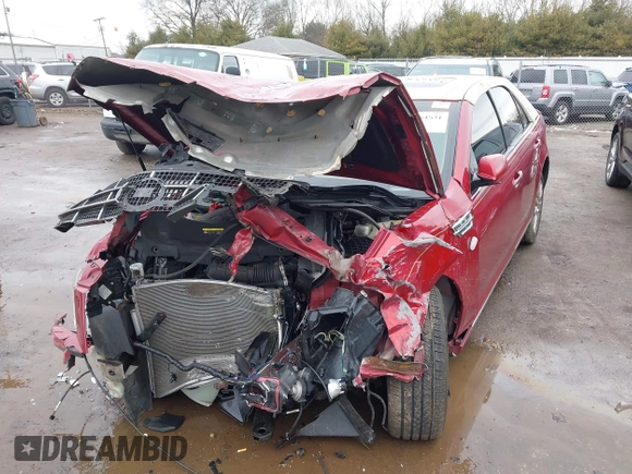 2011 Cadillac STS RWD with VIN 1G6DW6ED4B0128004, listed as a IAAI auction lot 41664631 with 546,850 mi miles and . Bid and sale history available at carsss.com. Image 2.