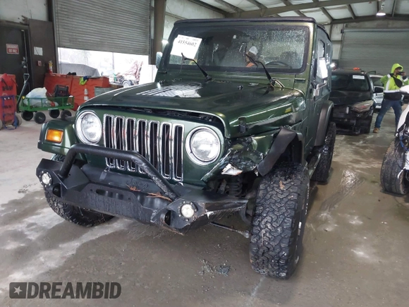 1998 Jeep Wrangler SE with VIN 1J4FY29P2WP733255, listed as a IAAI auction lot 41554602 with 157,316 mi miles. Bid and sale history available at carsss.com. Image 17.