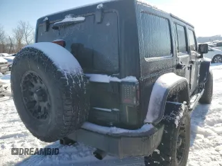 2013 Jeep Wrangler Unlimited Sport with VIN 1C4BJWDG7DL621806, listed as a Copart auction lot 87604805 with 158,885 mi miles and Salvage title. Bid and sale history available at DreamBid. Image 3.