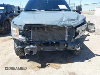 2020 Ford F-150 XL with VIN 1FTEW1E57LKE71523, listed as a IAAI auction lot 42265118 with 83,788 mi miles and . Bid and sale history available at DreamBid. Image 6.
