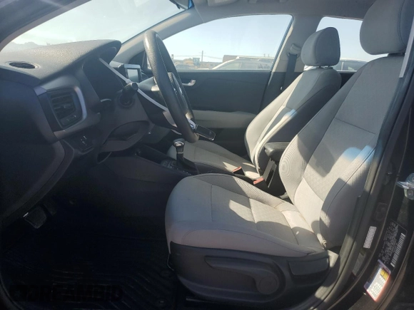 2020 Kia Rio LX with VIN 3KPA24AD6LE282471, listed as a Copart auction lot 77480084 with 59,218 mi miles and Salvage Title. Bid and sale history available at carsss.com. Image 7.