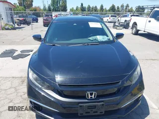 2020 Honda Civic LX with VIN 19XFC2F66LE213975, listed as a IAAI auction lot 42398098 with 69,902 mi miles and . Bid and sale history available at DreamBid. Image 12.