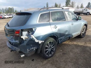 2014 Mazda CX-9 Grand Touring with VIN JM3TB3DV2E0435230, listed as a IAAI auction lot 41041440 with 145,538 mi miles and . Bid and sale history available at DreamBid. Image 4.