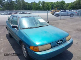 1994 Ford Escort z VIN 1FARP11J7RW270259, wystawiony jako IAAI lot #42341647 z przebiegiem 74 472 mil mil oraz . Historia ofert i sprzedaży dostępna na DreamBid. Obrazek 1.
