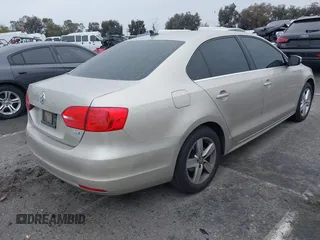 2014 Volkswagen Jetta TDI w/Premium with VIN 3VWLL7AJ3EM231190, listed as a IAAI auction lot 41722137 with 100,965 mi miles and . Bid and sale history available at DreamBid. Image 4.