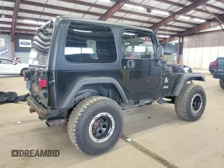 2004 Jeep Wrangler Sport with VIN 1J4FA49S64P722986, listed as a Copart auction lot 51840985 with 129,761 mi miles and Clean Title. Bid and sale history available at carsss.com. Image 3.