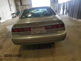 1997 Toyota Camry LE with VIN JT2BG22K8V0082736, listed as a Copart auction lot 58735955 with 54,699 mi miles and Salvage title. Bid and sale history available at DreamBid. Image 6.