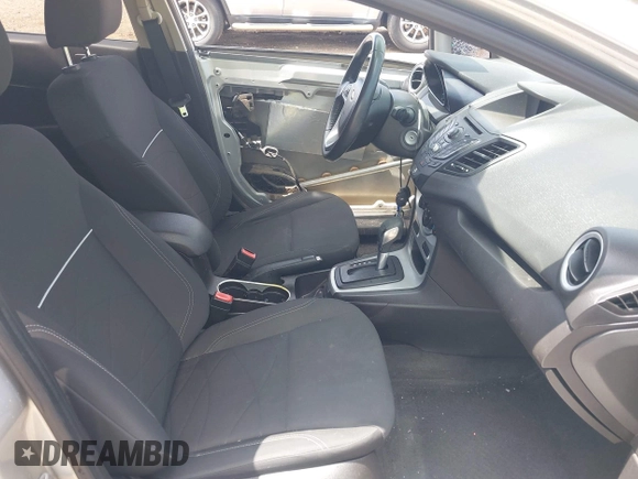 2014 Ford Fiesta SE with VIN 3FADP4EJ4EM151911, listed as a IAAI auction lot 42096321 with 129,938 mi miles and . Bid and sale history available at DreamBid. Image 5.