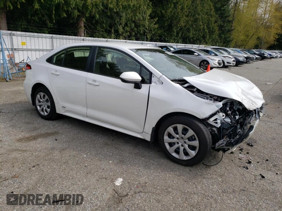 2023 Toyota Corolla Hybrid LE with VIN JTDBDMHE2PJ002549, listed as a Copart auction lot 50378594 with 5,028 mi miles and Salvage Title. Bid and sale history available at carsss.com. Image 4.
