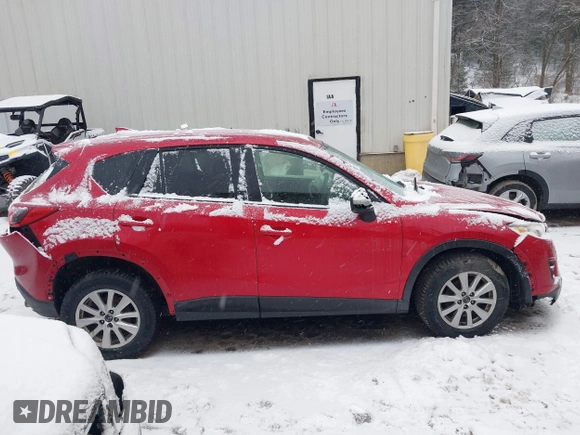 2016 Mazda CX-5 Touring with VIN JM3KE2CY3G0651194, listed as a IAAI auction lot 41657288 with 1 mi miles. Bid and sale history available at carsss.com. Image 12.