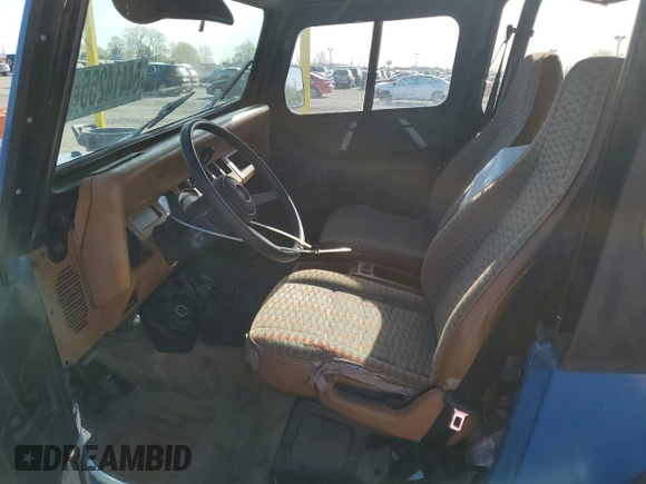 1995 Jeep Wrangler S z VIN 1J4FY19P8SP300768, wystawiony jako Copart lot #54414255 z przebiegiem 199 044 mil mil oraz Szkoda całkowita • Salvage title. Historia ofert i sprzedaży dostępna na DreamBid. Obrazek 7.