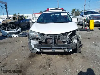 2015 Toyota RAV4 XLE with VIN JTMWFREV9FJ034992, listed as a IAAI auction lot 41922694 with 100,956 mi miles. Bid and sale history available at carsss.com. Image 6.