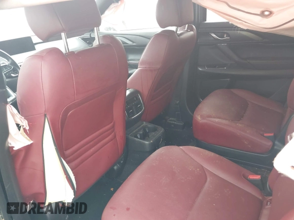2021 Mazda CX-9 Grand Touring with VIN JM3TCADY2M0509286, listed as a IAAI auction lot 39976279 with 93,588 mi miles and . Bid and sale history available at DreamBid. Image 8.