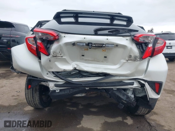 2020 Toyota C-HR LE with VIN JTNKHMBX9L1092934, listed as a IAAI auction lot 42021972 with 56,777 mi miles and . Bid and sale history available at DreamBid. Image 6.