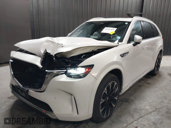 2024 Mazda CX-90 S Premium z VIN JM3KKDHCXR1103272, wystawiony jako IAAI lot #40301969 z przebiegiem 5 235 mil mil oraz . Historia ofert i sprzedaży dostępna na DreamBid. Obrazek 19.