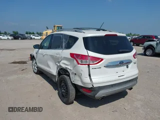 2015 Ford Escape Titanium with VIN 1FMCU0JX4FUB07322, listed as a IAAI auction lot 42220345 with 184,852 mi miles and . Bid and sale history available at DreamBid. Image 3.