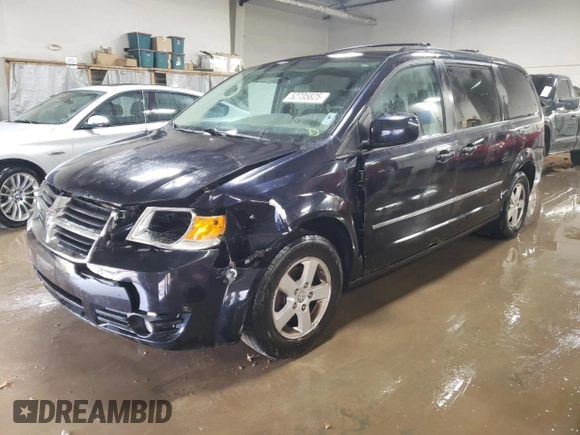 2010 Dodge Grand Caravan SXT with VIN 2D4RN5D15AR140564, listed as a Copart auction lot 52735825 with 187,744 mi miles and Salvage Title. Bid and sale history available at DreamBid. Image 1.