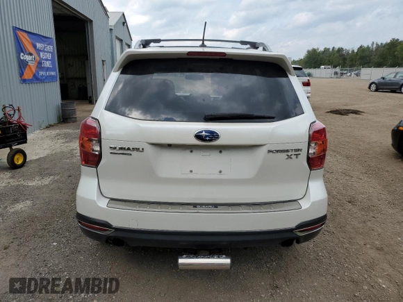 2014 Subaru Forester with VIN JF2SJHPC3EH490240, listed as a Copart auction lot 67876064 with 195,561 mi miles and Salvage title. Bid and sale history available at DreamBid. Image 6.