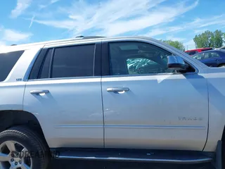 2016 Chevrolet Tahoe LTZ with VIN 1GNSKCKC1GR452600, listed as a IAAI auction lot 42305719 with 121,041 mi miles and . Bid and sale history available at DreamBid. Image 13.
