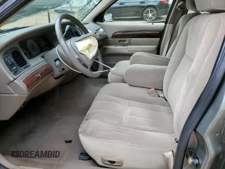 2003 Mercury Grand Marquis GS Convenience z VIN 2MEFM74W03X647685, wystawiony jako Copart lot #54104505 z przebiegiem 67 396 mil mil oraz Szkody całkowita. Historia ofert i sprzedaży dostępna na DreamBid. Obrazek 7.