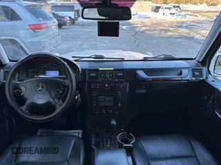2003 Mercedes-Benz G-Class with VIN WDCYR49E23X141382, listed as a IAAI auction lot 41654677 with 329,762 mi miles. Bid and sale history available at carsss.com. Image 6.