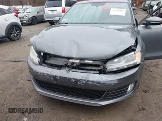 2012 Volkswagen Jetta GLI Autobahn with VIN 3VW5A7AJ5CM410777, listed as a IAAI auction lot 41729287 with 116,427 mi miles and . Bid and sale history available at DreamBid. Image 6.