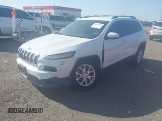 2014 Jeep Cherokee Latitude with VIN 1C4PJLCB1EW226188, listed as a IAAI auction lot 41869119 with 54,478 mi miles. Bid and sale history available at carsss.com. Image 2.