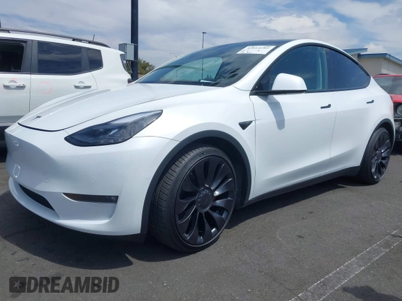 2022 Tesla Model Y Performance with VIN 7SAYGDEF8NF407109, listed as a IAAI auction lot 42014282 with 24,937 mi miles and . Bid and sale history available at DreamBid. Image 2.