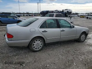 1996 Mercedes-Benz E Class with VIN WDBJF20F9TJ003169, listed as a Copart auction lot 45449525 with 171,754 mi miles and Salvage Title. Bid and sale history available at carsss.com. Image 3.